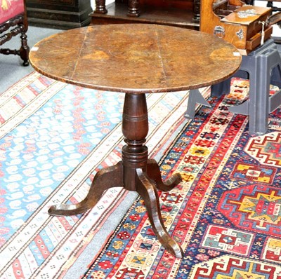 Lot 67 - An 18th Century pollard elm circular table on...