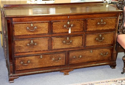 Lot 88 - An oak blanket chest with three false drawers,...