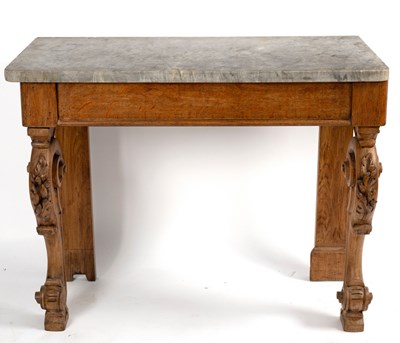 Lot 94 - A pine console table with grey marble top on...