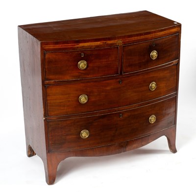 Lot 110 - A mahogany bowfront chest of three long...