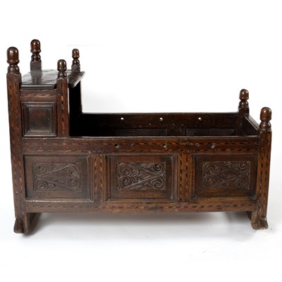 Lot 115 - A late 17th Century carved oak cradle with...