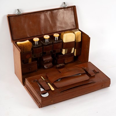 Lot 130 - A gentleman's fitted leather dressing case,...