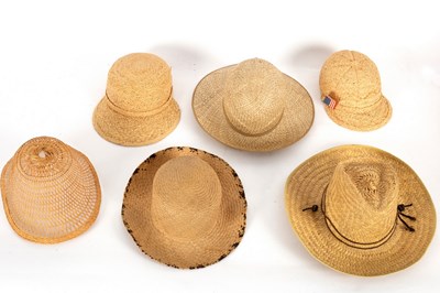 Lot 135 - A topee type hat and five other straw hats