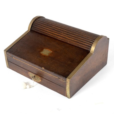 Lot 160 - A Regency mahogany writing slope with tambour...