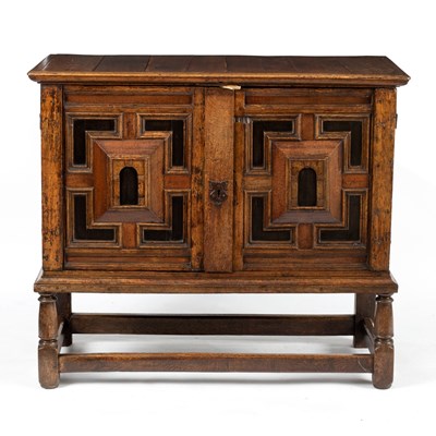 Lot 168 - An oak cabinet on later stand, 17th Century,...