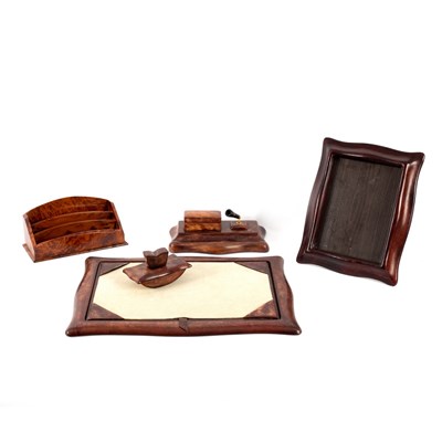 Lot 172 - A leather desk set of five pieces