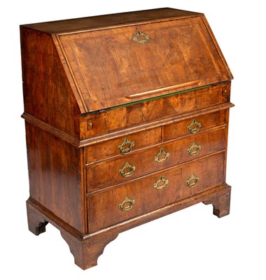 Lot 178 - A George II walnut bureau banded in...