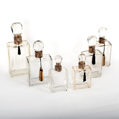 Lot 199 - Six graduated glass decanters, all with silver...