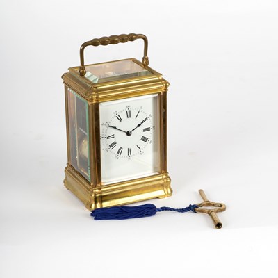 Lot 201 - A gilt brass eight-day carriage clock with...