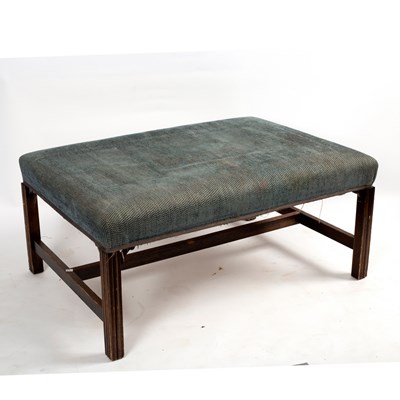 Lot 213 - A rectangular and upholstered stool on fluted...