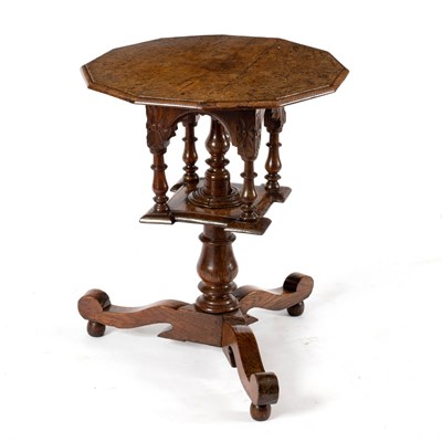 Lot 220 - A pollard oak revolving centre table, the...