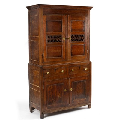 Lot 234 - An 18th Century oak food cupboard with pierced...