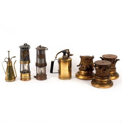 Lot 243 - Two steel and brass miners' lamps, two brass...