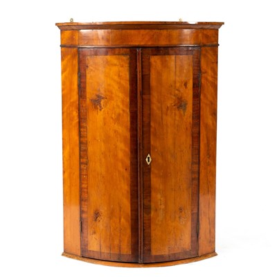 Lot 260 - An oak and mahogany corner cupboard with...