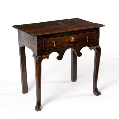 Lot 268 - An 18th Century oak kneehole desk fitted a...