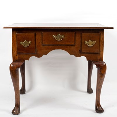 Lot 300 - A late 18th Century oak kneehole table, fitted...