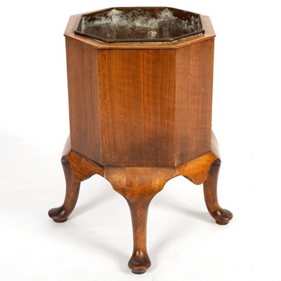 Lot 308 - A walnut rectangular jardini?re stand on...