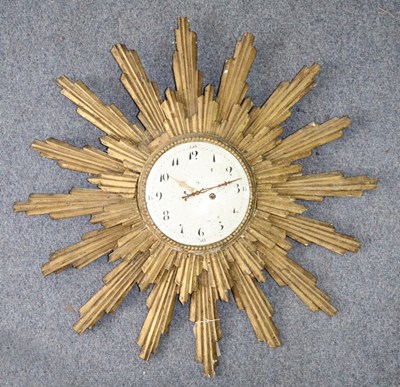 Lot 325 - A late 18th Century giltwood sunburst wall...