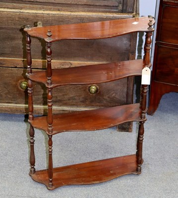 Lot 328 - A set of four-tier hanging shelves with...