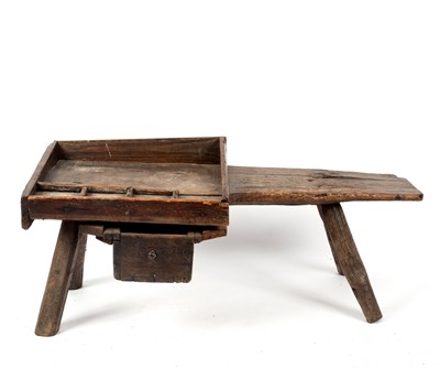 Lot 337 - A cobbler's rustic elm bench, fitted a drawer,...