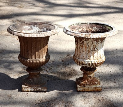 Lot 355 - A pair of campana shaped cast iron vases on...