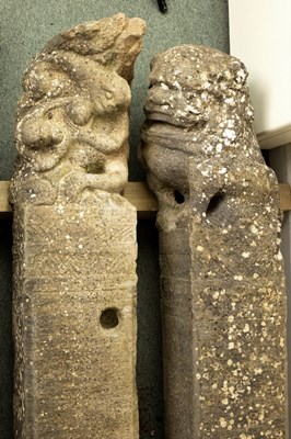 Lot 375 - A pair of Chinese carved stone hitching posts...