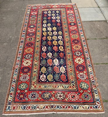 Lot 407 - A late 19th Century Caucasian Kazak runner,...