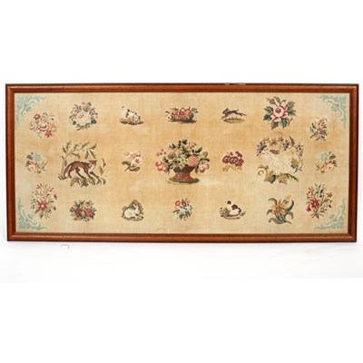 Lot 413 - A needlework panel depicting flowers and...