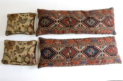 Lot 415 - Two carpet covered cushions and a pair of...