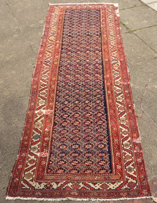 Lot 416 - A Feraghan runner, all over geometric design...