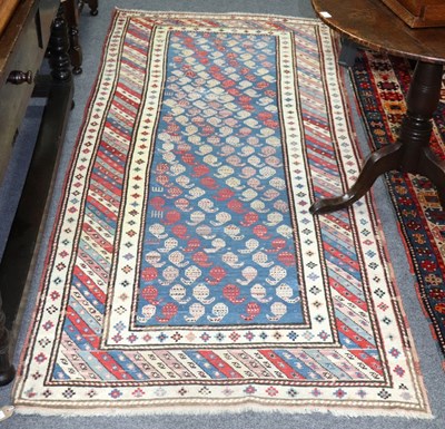 Lot 425 - A late 19th Century Kazak rug, 225cm x 110cm