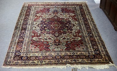 Lot 440 - A Kashan rug with floral design to the central...