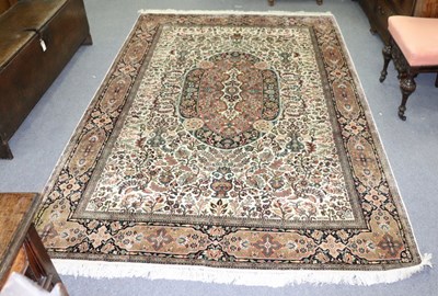 Lot 443 - A modern Kashmir silk rug with central...