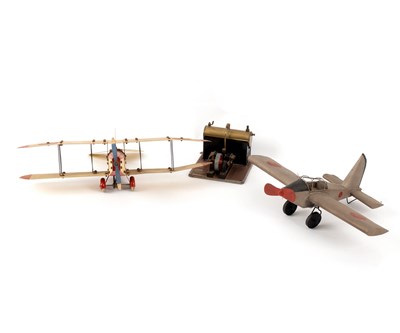 Lot 461 - A Meccano model bi-plane, with pilot, another...