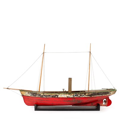 Lot 475 - A steam powered model boat with single funnel...