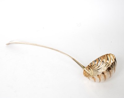 Lot 673 - A George III silver ladle, London 1809, with...