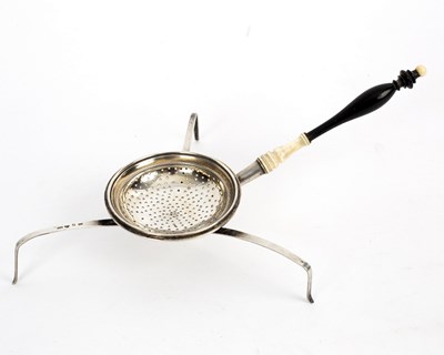 Lot 681 - An unusual silver tea strainer, circa 1888,...