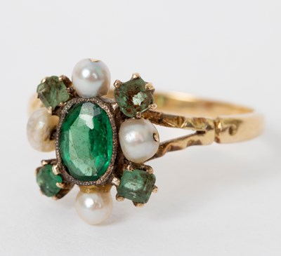 Lot 700 - A Victorian emerald and pearl dress ring, the...