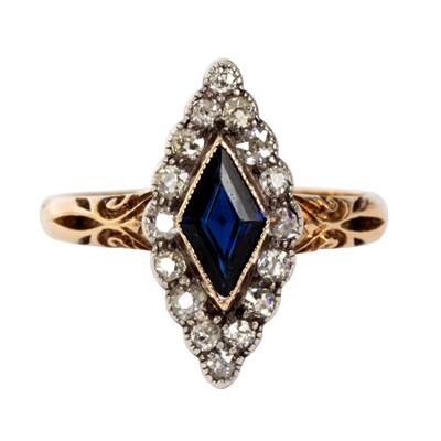 Lot 708 - A sapphire and diamond cluster ring of...