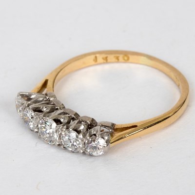 Lot 711 - A diamond five-stone ring, the stones claw set...