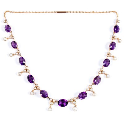 Lot 715 - An Edwardian amethyst and pearl fringe...