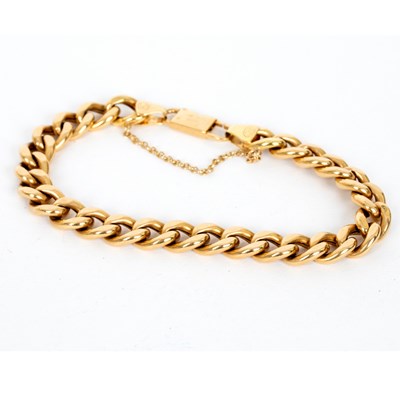 Lot 724 - An Italian 18ct yellow gold curb link bracelet,...