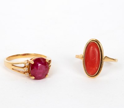 Lot 735 - A ruby and diamond dress ring, the large oval...