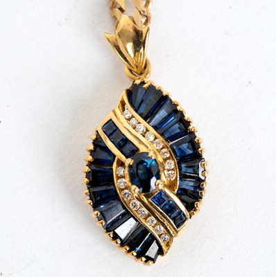 Lot 741 - A sapphire and diamond pendant of stylised...