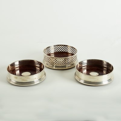 Lot 1 - A pair of modern silver wine coasters and...