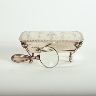 Lot 2 - A silver dressing table box with hinged cover...