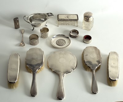 Lot 12 - A modern silver sauceboat, and sundry small...