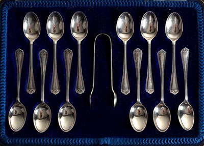 Lot 13 - A cased set of twelve silver teaspoons and...