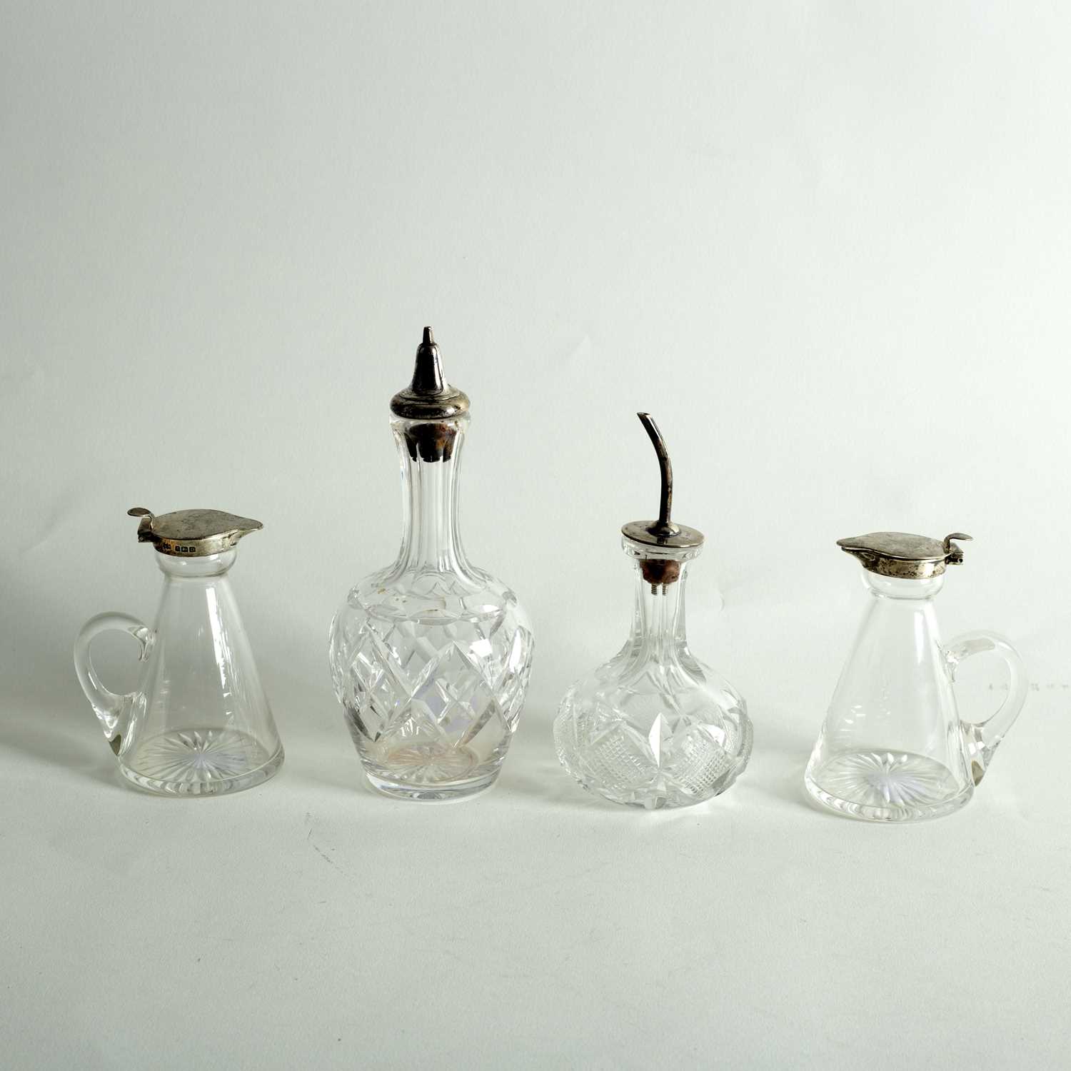Lot 27 - A pair of cruet bottles with silver mounts, H...