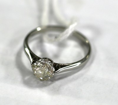 Lot 118 - A diamond solitaire ring, the cushion cut...